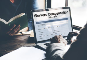 workers compensation on laptop screen