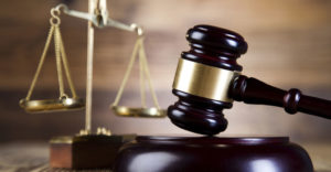 Scales of justice and gavel for Chicago Foreclosure Lawyer